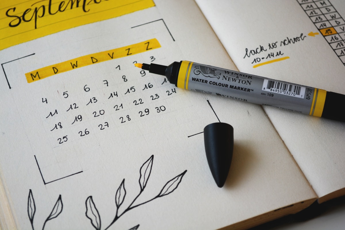 Calendar and scheduling on a laptop screen.